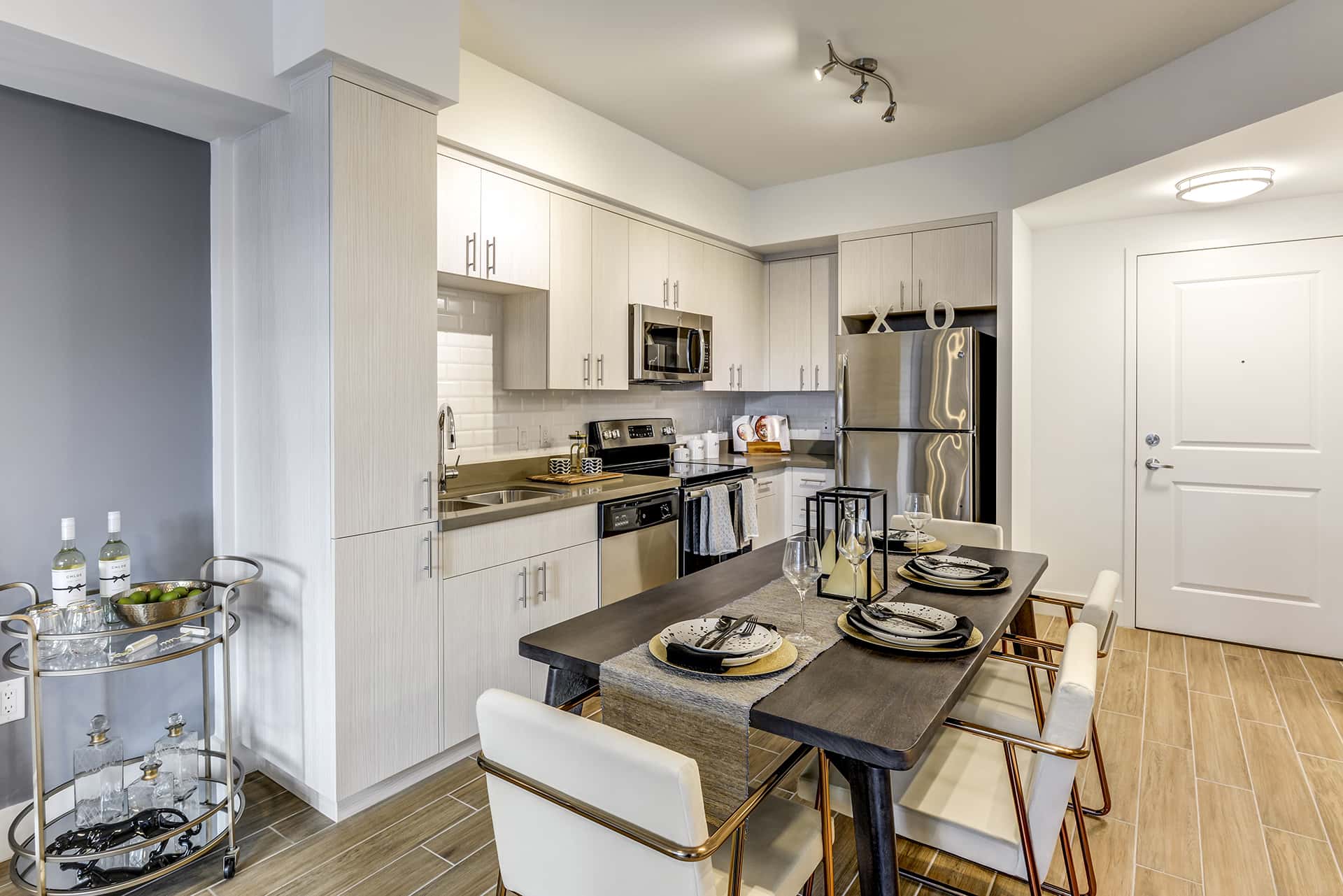 Apartments for Rent in North Miami Beach, FL - Lazul Kitchen with Stainless Steel Appliances, Stylish Decor, and Modern Wood Cabinets